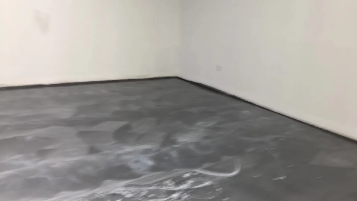 Gray floor coating in progress